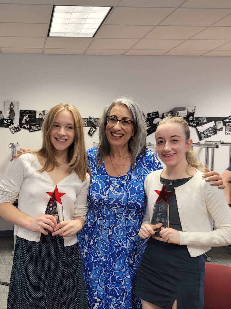 Photo of Senior Grace Ruganis and Junior Anya Martyniuk and Susan Mojave, Theater Manager of the Dr. James A. Meyer Performing Arts Center